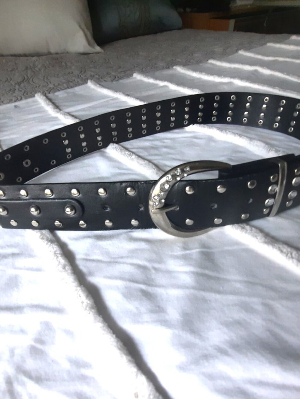 Faux leather belt with metal studs and rhinestones